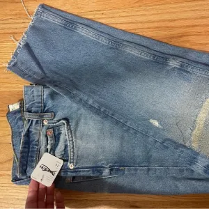 - Free people distressed knee with already edge bottoms