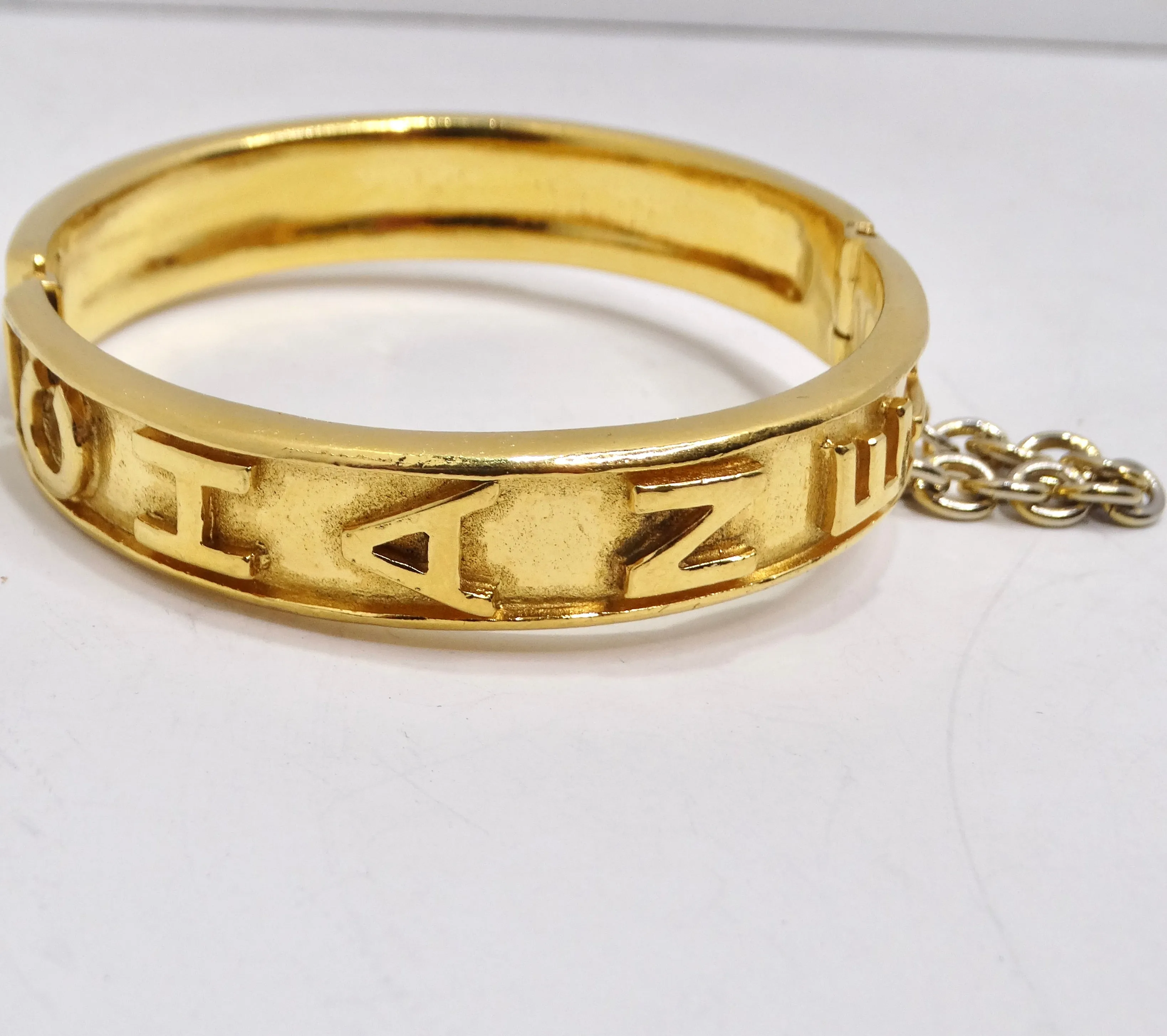 Chanel 1980s Gold Tone Logo Bangle